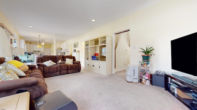 living room featuring light carpet