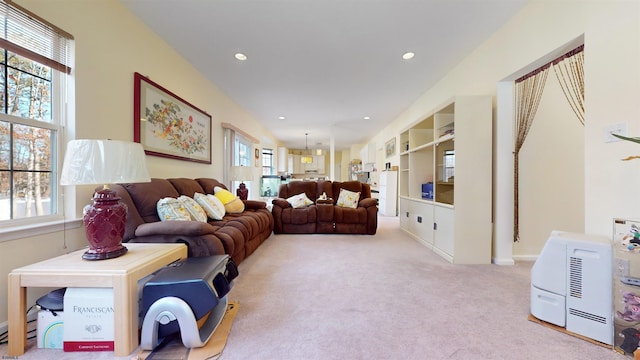 living room featuring light carpet