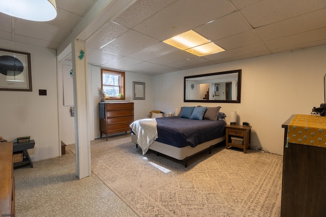 bedroom featuring a drop ceiling