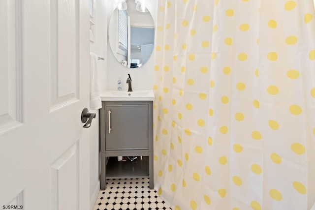 bathroom with vanity and walk in shower