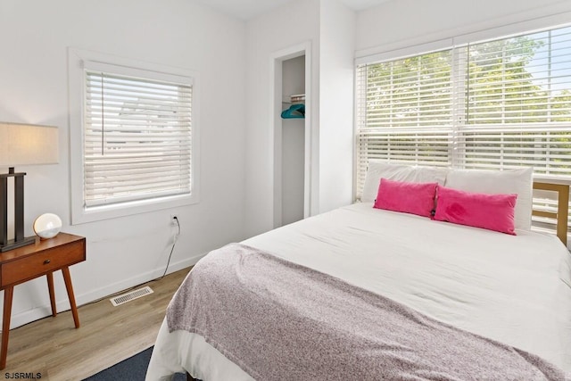 bedroom featuring wood-type flooring