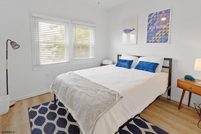 bedroom featuring light hardwood / wood-style flooring