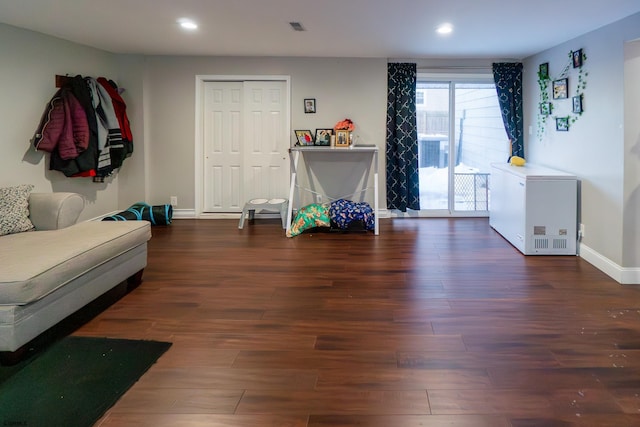 interior space with dark hardwood / wood-style floors