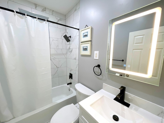 full bathroom featuring vanity, shower / tub combo, and toilet