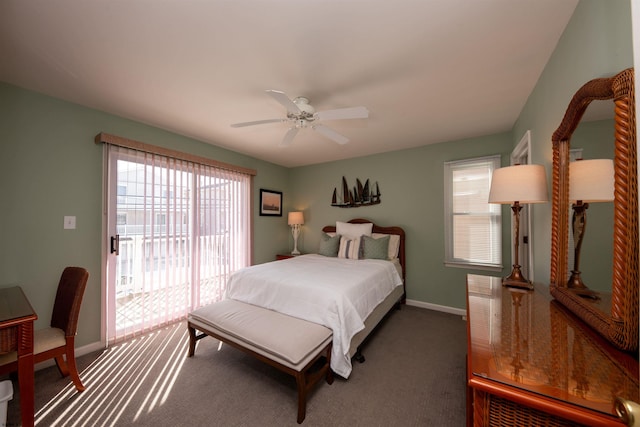 bedroom featuring ceiling fan, dark carpet, and access to exterior