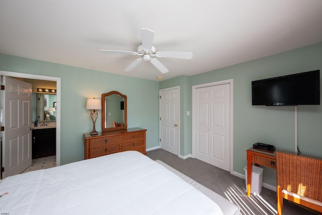 carpeted bedroom with ceiling fan and connected bathroom