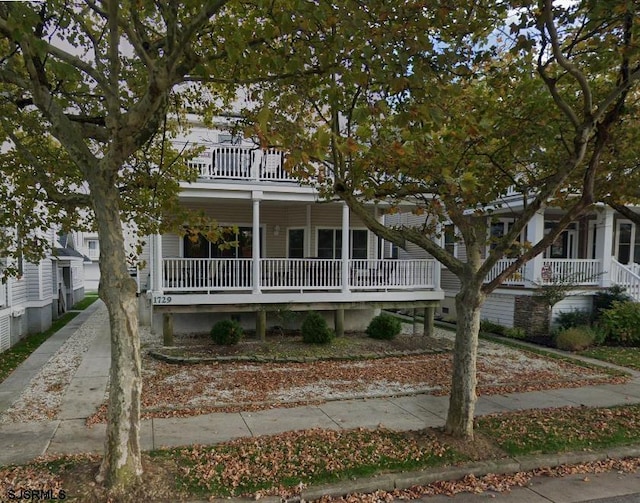 view of front of home with a balcony