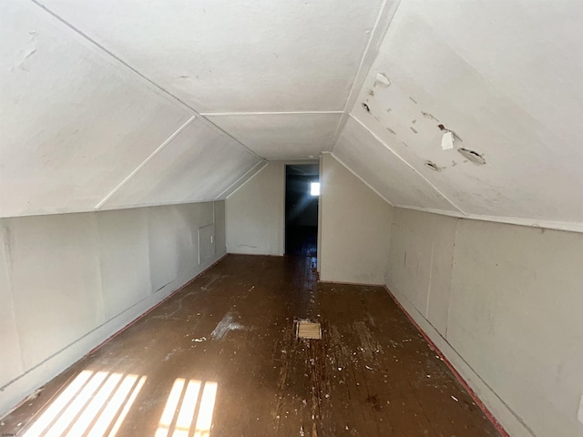 bonus room featuring lofted ceiling