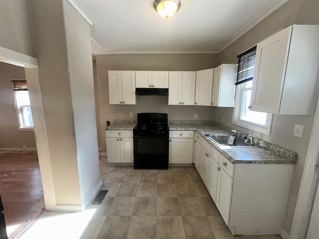 kitchen with white cabinets, a healthy amount of sunlight, black range oven, and sink