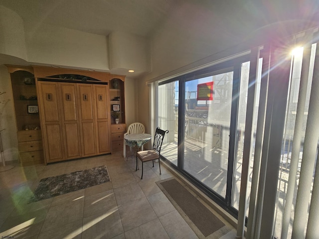 interior space featuring light tile patterned floors