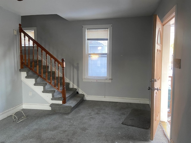 view of carpeted foyer