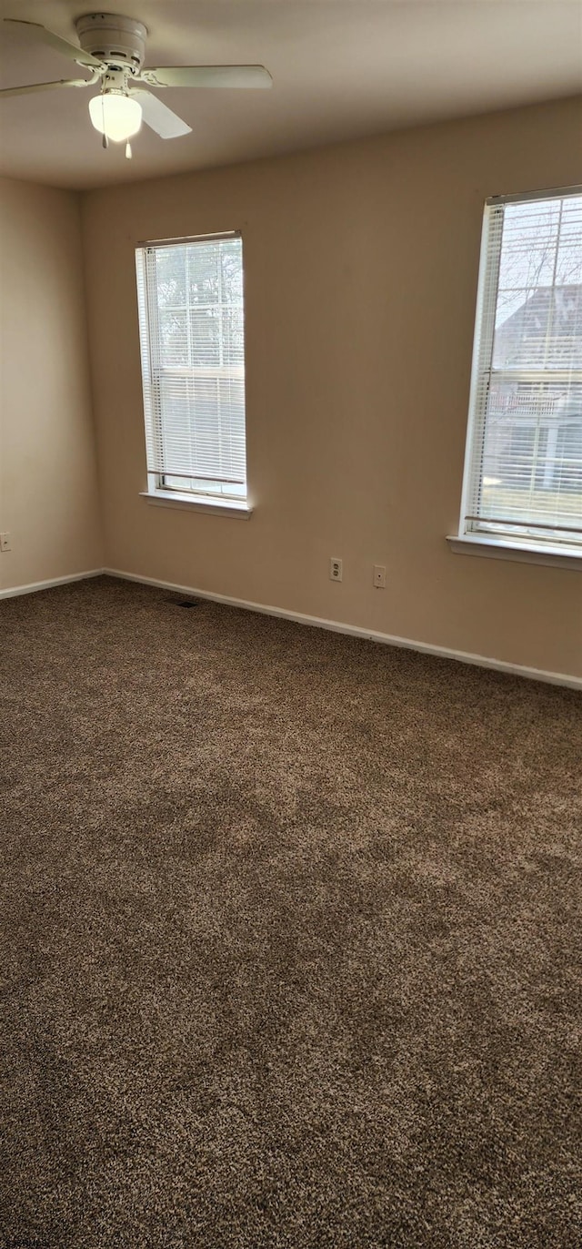 empty room with ceiling fan