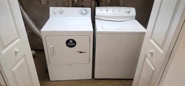 washroom featuring independent washer and dryer