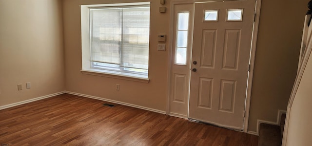 entrance foyer with dark hardwood / wood-style flooring