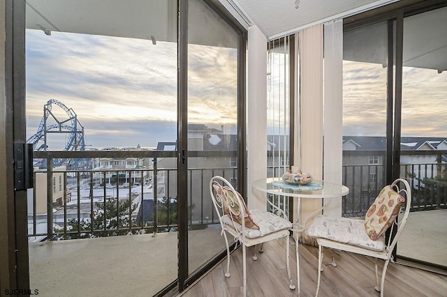 view of balcony at dusk