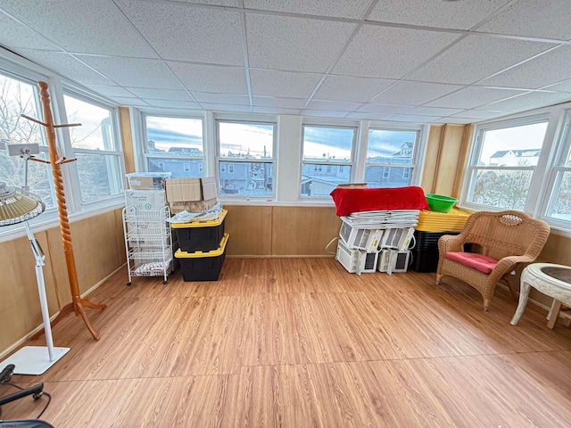 sunroom featuring a paneled ceiling