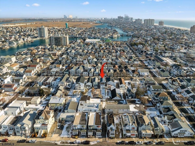 drone / aerial view with a water view