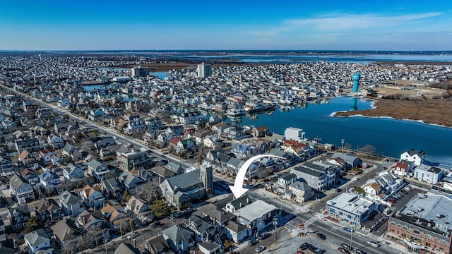 drone / aerial view with a water view