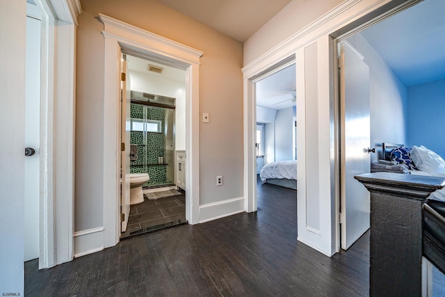 hall featuring dark hardwood / wood-style floors