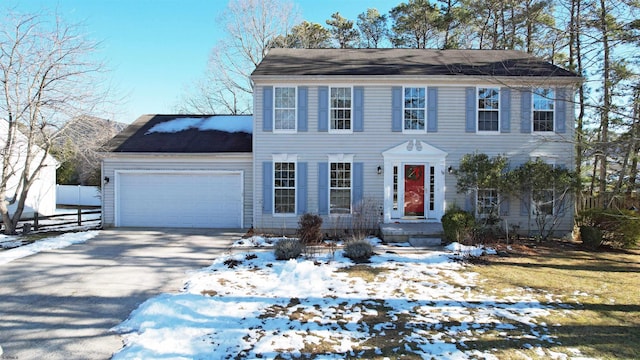 colonial-style house with a garage