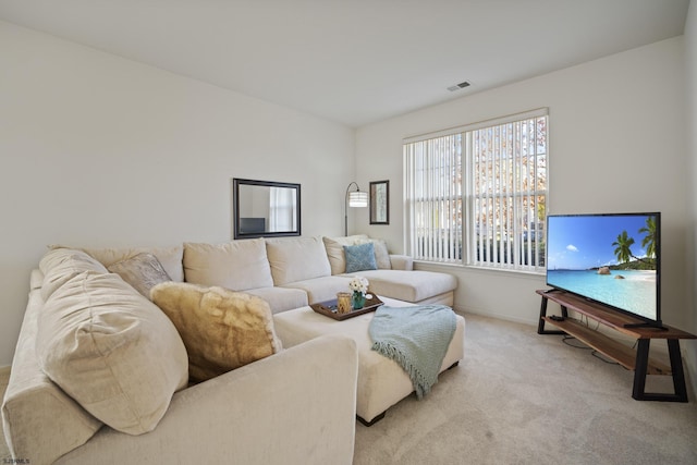 living room with light colored carpet