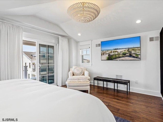 bedroom featuring access to exterior, dark hardwood / wood-style floors, an inviting chandelier, and lofted ceiling