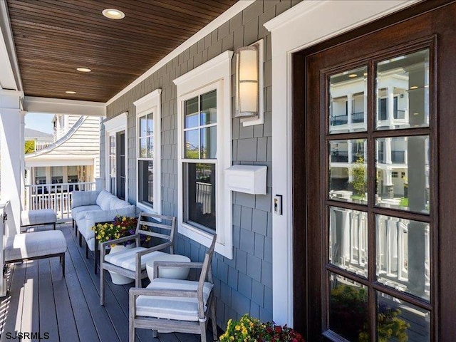 deck featuring covered porch