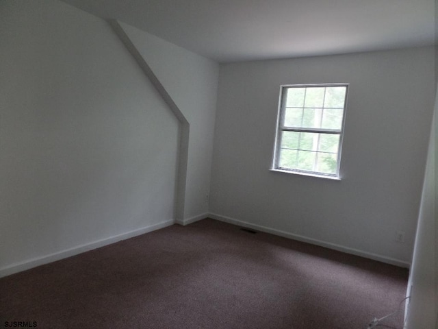 bonus room with carpet floors