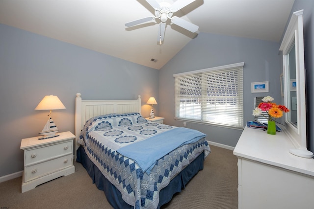 carpeted bedroom featuring ceiling fan and vaulted ceiling