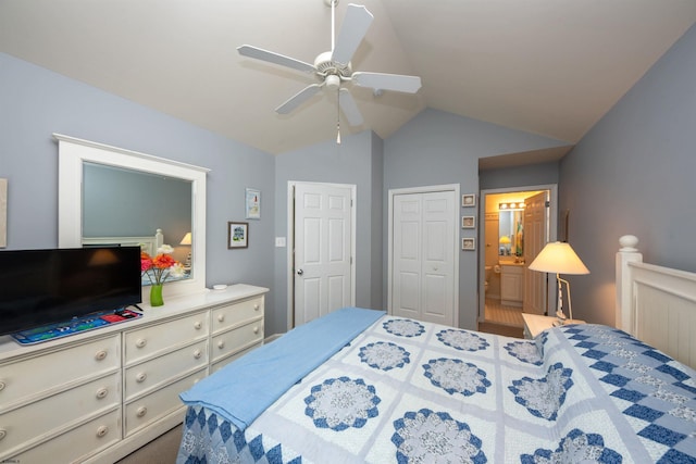 bedroom featuring vaulted ceiling, ensuite bath, and ceiling fan