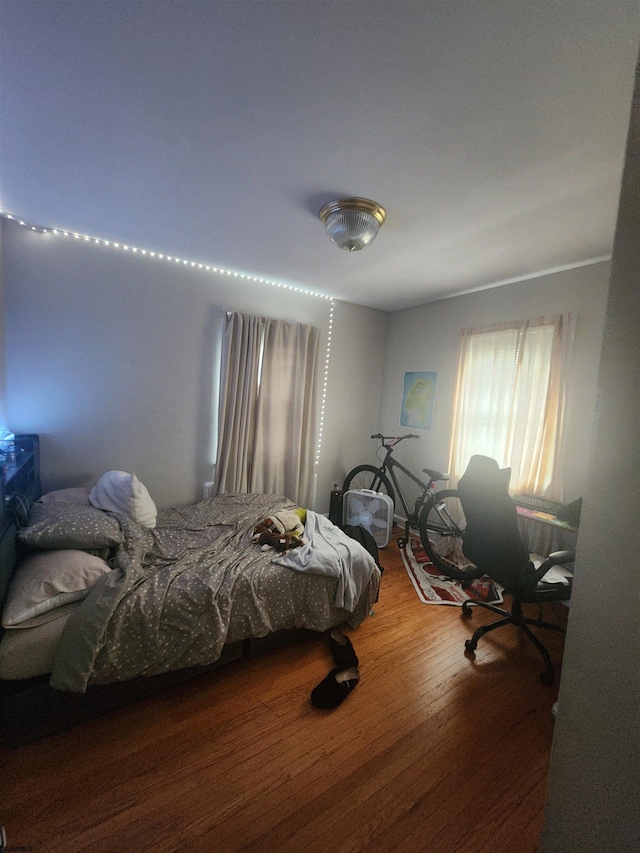 bedroom featuring hardwood / wood-style floors