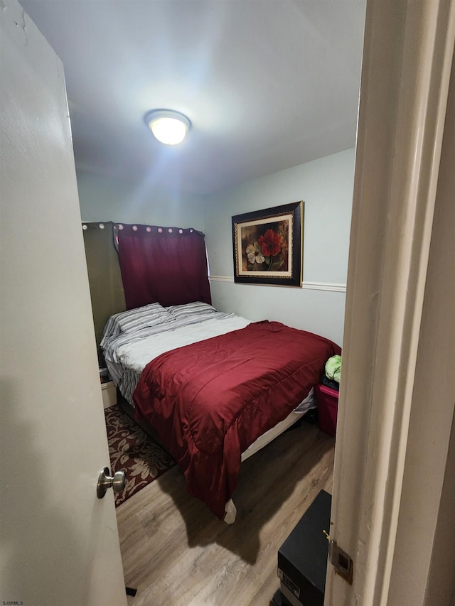 bedroom featuring light wood-type flooring