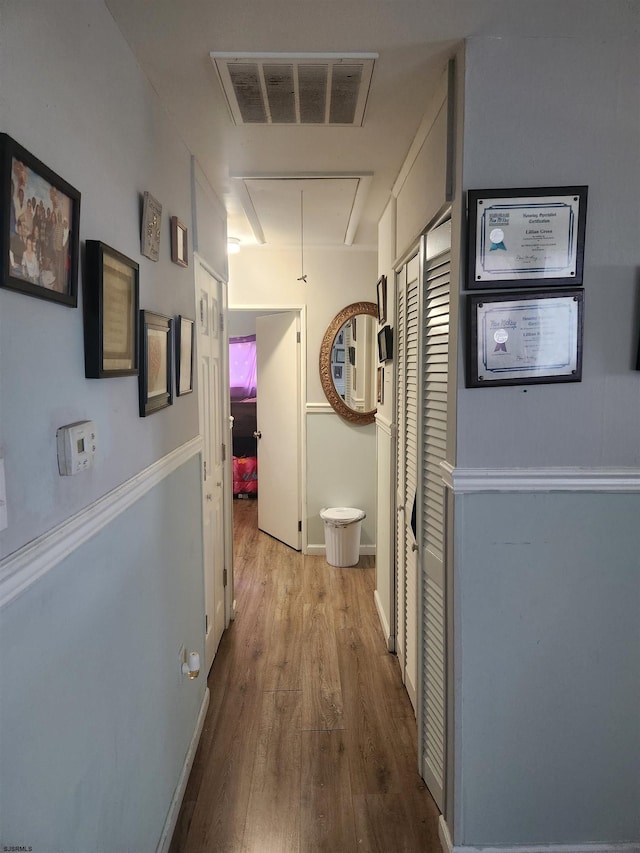 hall featuring light hardwood / wood-style flooring