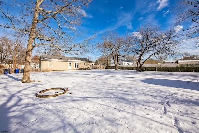 view of yard covered in snow