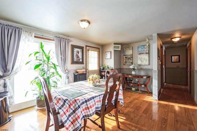 dining area featuring wood-type flooring