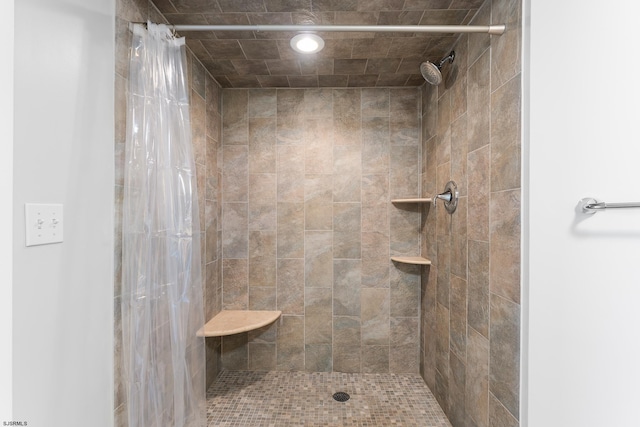 bathroom featuring walk in shower