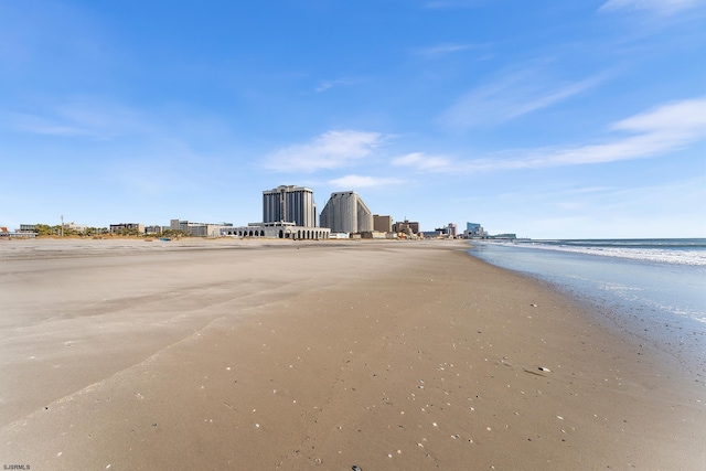 property view of water featuring a view of the beach