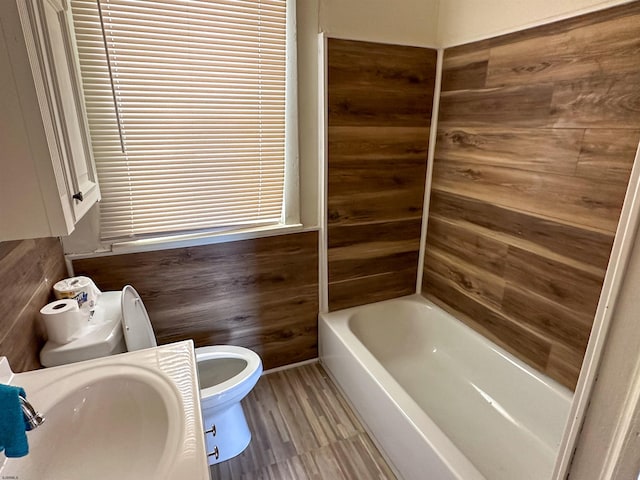 bathroom featuring sink and toilet