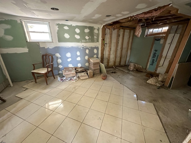 miscellaneous room featuring light tile patterned floors