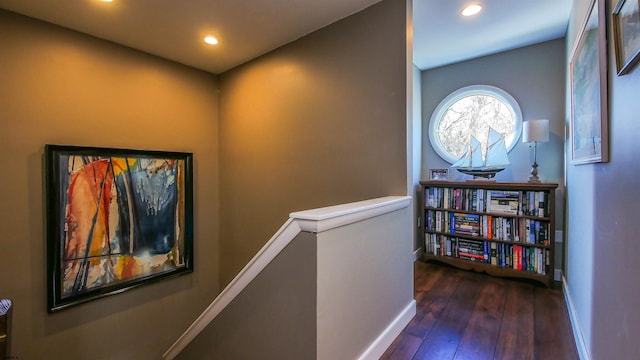 hallway with dark wood-type flooring