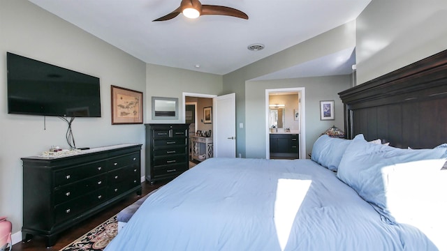 bedroom with ensuite bathroom, ceiling fan, and dark hardwood / wood-style floors