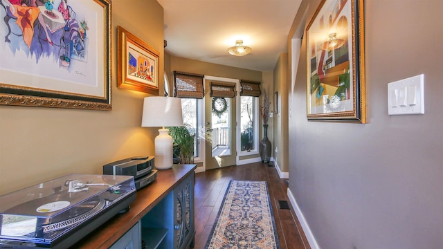 interior space with dark hardwood / wood-style flooring