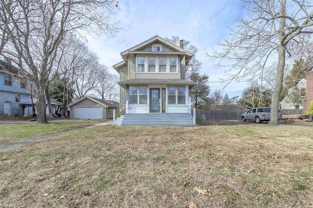 victorian-style house with a front lawn, a garage, and an outdoor structure