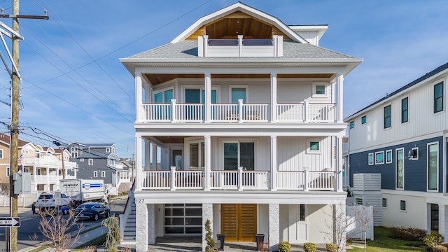 view of front of home with a balcony