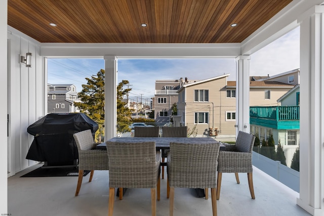 exterior space featuring wooden ceiling and plenty of natural light