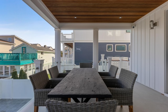 view of patio featuring a balcony