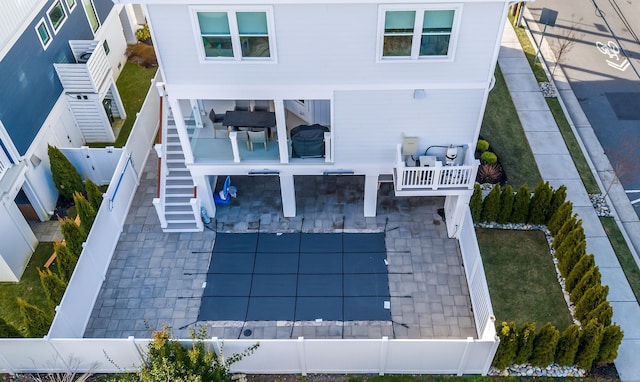 rear view of house featuring outdoor lounge area