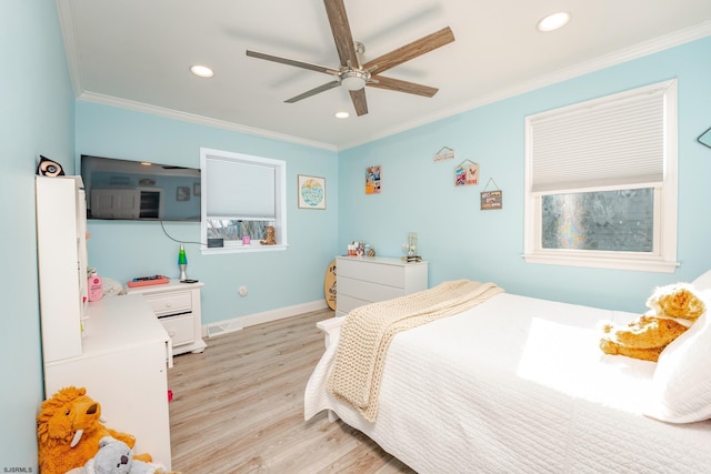 bedroom with light wood-type flooring, ceiling fan, and crown molding