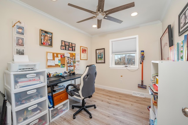 home office with light hardwood / wood-style floors, ceiling fan, and ornamental molding