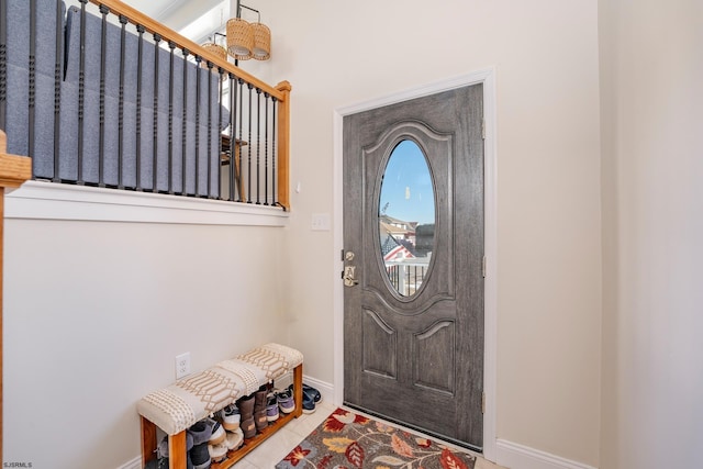 foyer entrance featuring tile patterned floors